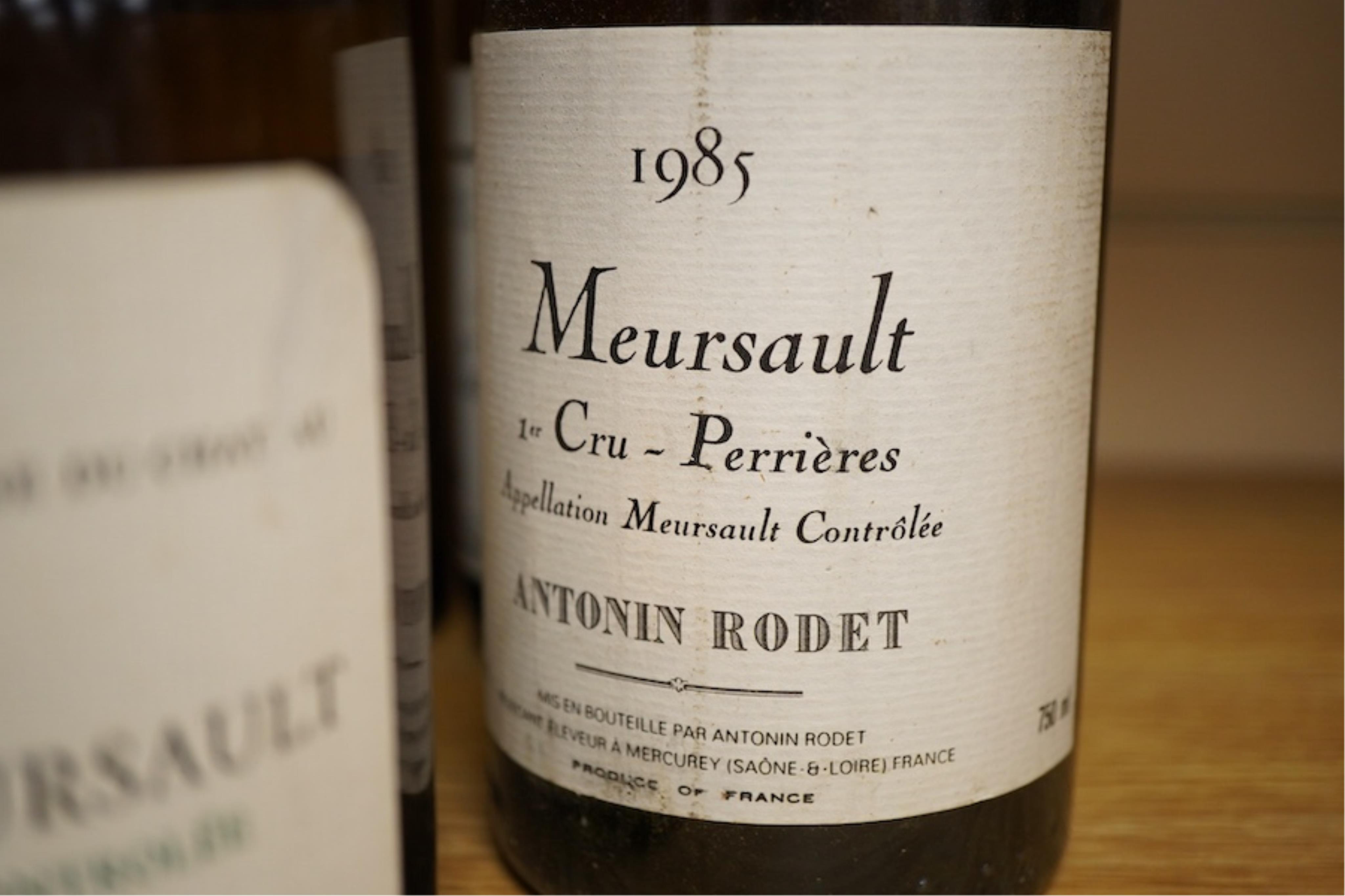 Eleven bottles of white burgundy including three Jean Chartron Puligny-Montrachet Premier Cru, 1985, two Antonin Rodet Meursault 1er Cru Perrieres, 1985, four various Puligny-Montrachet, a Domaine du Chateau de Meursault